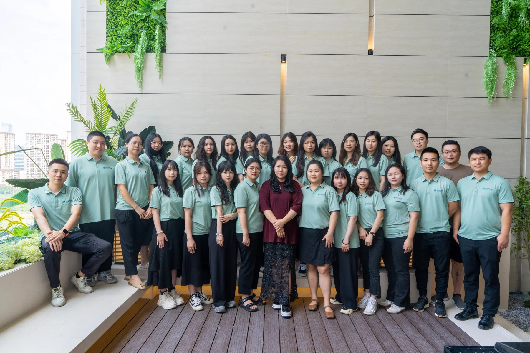 Yanchao team group photograph on a terrace