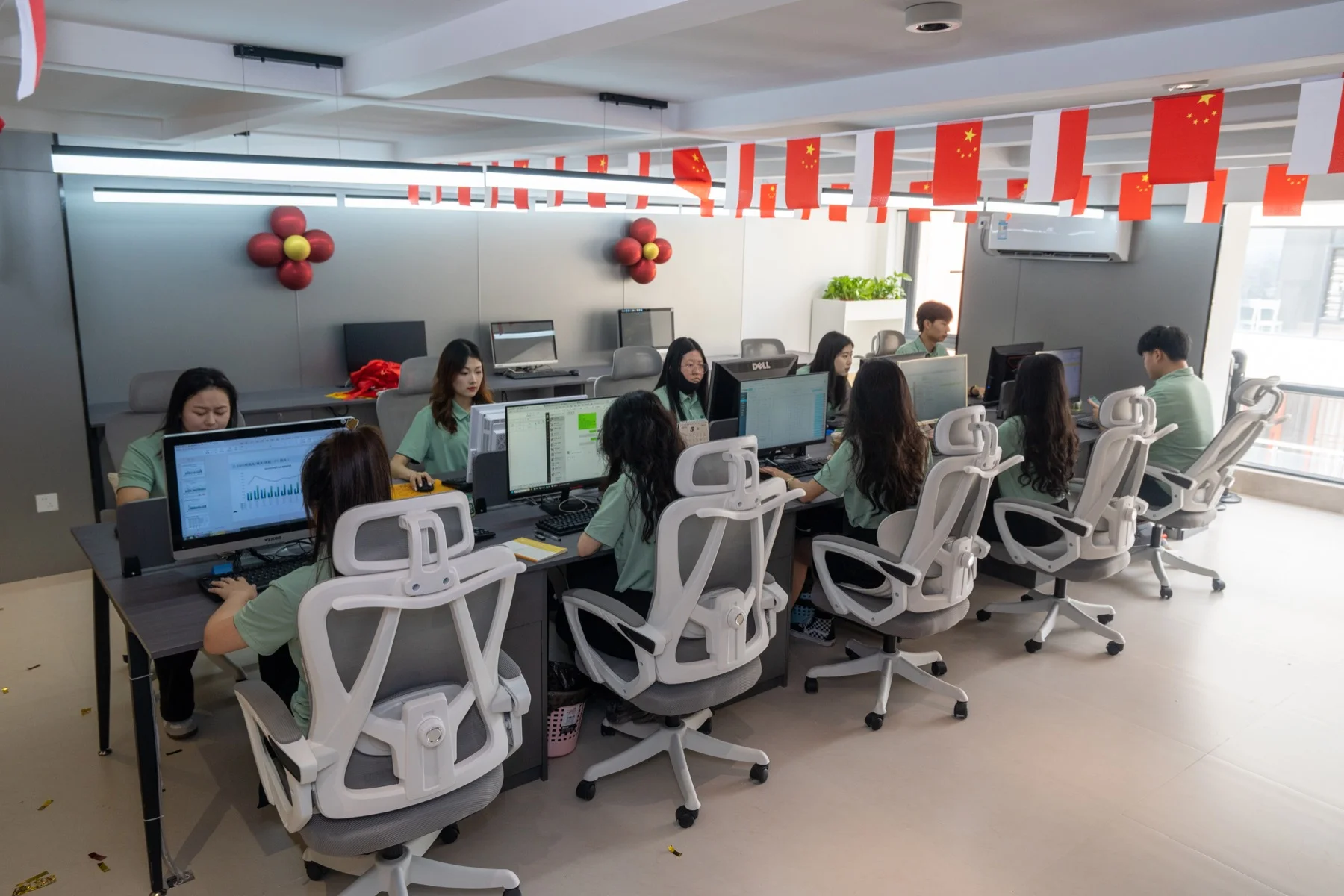 Yanchao team working at shared office desks